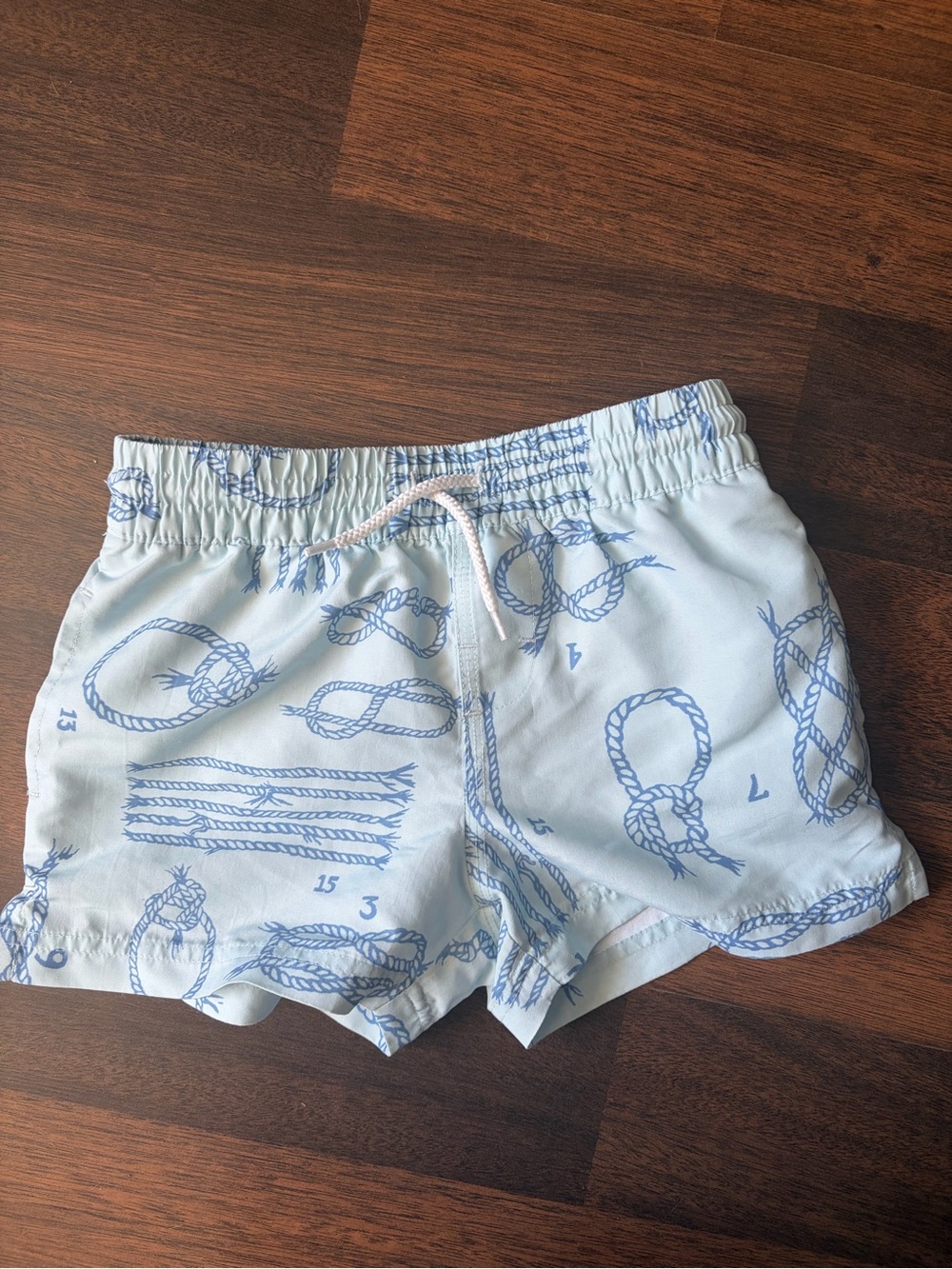 The Beaufort Bonnet Company Light Blue Swim Trunks with Navy Rope Motif